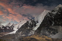 Sunset on Yerupaja and Sarapo mountains from Sarapococha Lake, Cordillera Huayhuash, Andes, Peru