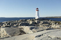 Peggys Point Lighthouse overlooking St. Margarets Bay, Peggys Cove, Nova Scotia, Canada