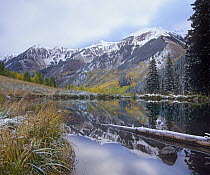 Pond and mountains after light snowstorm, Maroon Bells-Snowmass Wilderness Area, Colorado