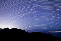Light trails from airplanes and boats with star trails at night, Mount Tamalpais State Park, California