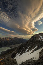 Clouds at dusk over Tasman Glacier valley, seen from summit of Mount Kinsey, Mount Cook National Park, Canterbury, New Zealand