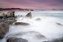 Waves washing up on rocky coast, Kejimkujik National Park, Nova Scotia, Canada