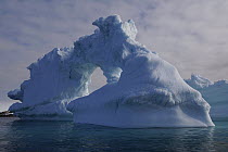 Natural arch in iceberg, Greenland