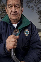 Pacific Lamprey (Petromyzon tridentatus) held by recently deceased Elmer Crow Junior, a Nez Perce elder and technical supervisor for the Nez Perce Department Of Fisheries Resources Management, Washing...