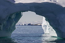 Natural arch in iceberg, Gerlache Strait, Antarctic Peninsula, Antarctica