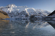 Mount Sefton reflection in ice covered Mueller Lake, Mount Cook National Park, Canterbury, New Zealand