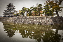 Castle and moat in autumn, Matsumoto Castle, Japan