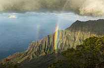 Rainbow over cliffs, Kalalau Valley, Na Pali Coast State Park, Kauai, Hawaii