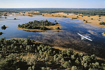 Airplane flying over wetland, Okavango Delta, Botswana