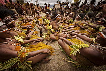 Men and women in ritual make-up and traditional clothing during a sing-sing, Goroka Show, Goroka, Eastern Highlands, Papua New Guinea