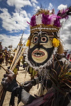 Man in ritual make-up and traditional clothing during a sing-sing, Goroka Show, Goroka, Eastern Highlands, Papua New Guinea
