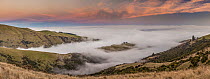 Ridge engulfed by fog, Tumbledown Bay, Banks Peninsula, Canterbury, New Zealand