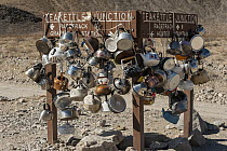 Sign with tea kettles, Tea Kettle Junction, Death Valley National Park, California