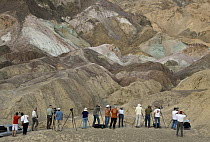 Photographers taking pictures of Artist's Pallet, Death Valley National Park, California