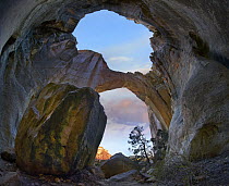 Rock arch at sunrise, La Ventana Arch, El Malpais National Monument, New Mexico