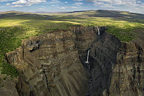 Waterfalls in deep canyon in plateau, Putoransky State Nature Reserve, Putorana Plateau, Siberia, Russia
