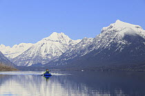 Kayaker on lake, Lake McDonald, Glacier National Park, Montana