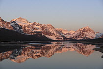 Mountain range along lake, Lake Sherburne, Many Glacier, Glacier National Park, Montana