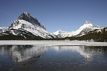 Mountains along lake, Swiftcurrent Lake, Glacier National Park, Montana