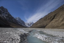 Glacial stream flowing in glacial valley, Sarychat-Ertash Strict Nature Reserve, Tien Shan Mountains, eastern Kyrgyzstan