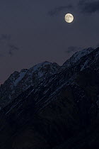 Moonrise over mountains, Ak-Shyirak Range, Sarychat-Ertash Strict Nature Reserve, Tien Shan Mountains, eastern Kyrgyzstan