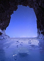 Cave at night during polar vortex, Lake Superior, Tettegouche State Park, Minnesota, multiple exposures