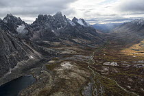 River flowing through valley in autumn, Tombstone Mountains, Tombstone Territorial Park, Yukon, Canada