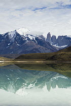 Mountains reflected in saline lake, Amarga Lagoon, Torres del Paine, Torres del Paine National Park, Patagonia, Chile