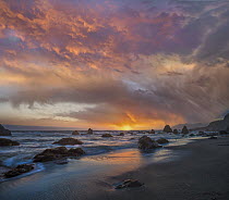 Sunset along coast near Arch Rock, California