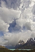 Clouds over granite peaks in spring, Lake Pehoe, Torres del Paine, Torres del Paine National Park, Patagonia, Chile
