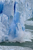 Ice calving off glacier, Lake Argentino, Los Glaciares National Park, Patagonia, Argentina