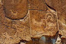 Petroglyph someone has attempted to remove with power tool, Grand Staircase-Escalante National Monument, Utah