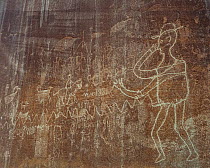 Ancient petroglyphs and modern day cowboy rock art near Neon Canyon, Grand Staircase-Escalante National Monument, Utah