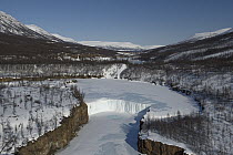Frozen river in valley in winter, Putoransky State Nature Reserve, Putorana Plateau, Siberia, Russia