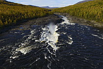 Waterfall and taiga in plateau, Putoransky State Nature Reserve, Putorana Plateau, Siberia, Russia