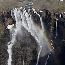 Rainbow over waterfalls in plateau, Putoransky State Nature Reserve, Putorana Plateau, Siberia, Russia