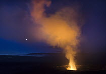 Volcano with crescent moon at night, Mount Kilauea, Hawaii Volcanoes National Park, Big Island, Hawaii