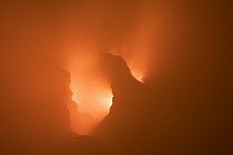 Smoke inside active volcanic crater, Erta Ale, Danakil Depression, Ethiopia