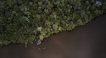Kayakers on lake, Palmari Reserve, Brazil