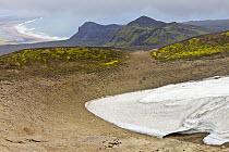 Remnants of snow among lava field, Snaefellsjoekull National Park, Snaefellsnes Peninsula, Iceland