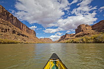Canoe on river in sandstone plateau, Green River, Canyonlands National Park, Utah
