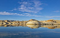 Sandstone hills along lake, Lake Powell, Glen Canyon National Recreation Area, Utah