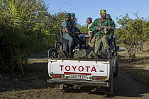 Anti-poaching scout deploying on patrol, Kafue National Park, Zambia