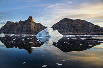 Iceberg along coast, Scoresby Sound, Greenland