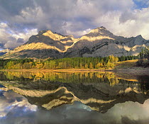 Mountains reflected in lake, Mount Kidd, Alberta, Canada