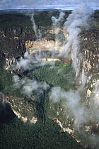 Mist spiraling in front of the cliffs of the Tepui, Canaima National Park, Venezuela