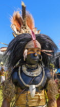 Indigenous person with black paint made from crude oil, Enga Show, Wabag, Western Highlands, Papua New Guinea