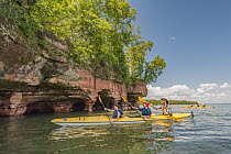 Kayakers and eroded lakeshore, Apostle Islands National Lakeshore, Lake Superior, Wisconsin