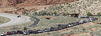 Vehicles at park entrance, Arches National Park, Utah