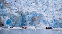 Tourists and calving glacier, South Sawyer Glacier, Alaska